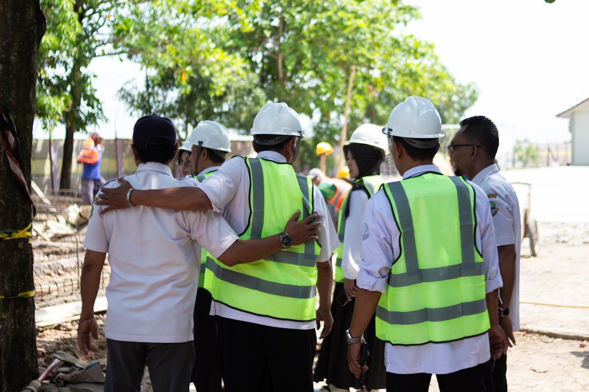 Mining safety briefing with workers in PPE